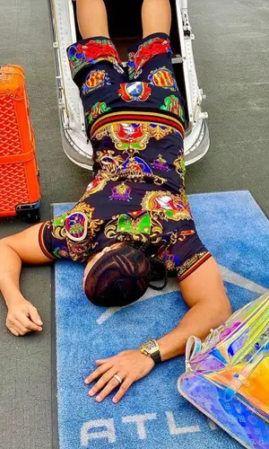El Alfa El Jefe wearing Louis Vuitton backpack