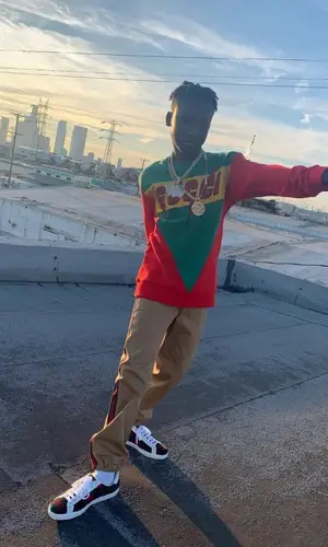 YNW BSlime wearing Gucci pants