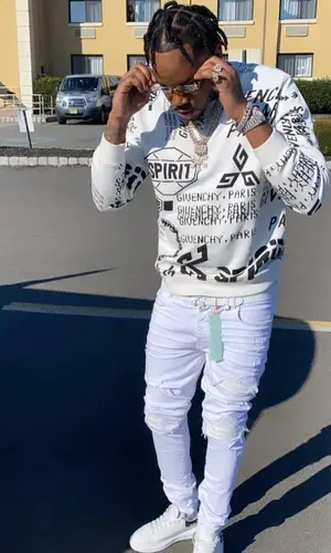 Fivio Foreign wearing Givenchy sweatshirt