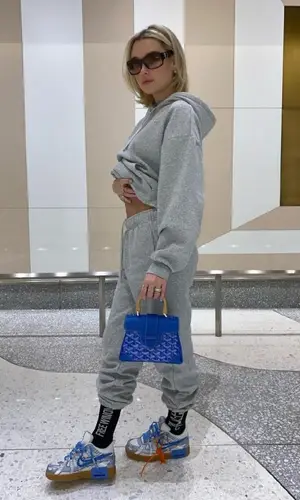 Sarah Snyder wearing Nike sneakers