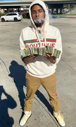 Pooh Shiesty wearing Gucci hoody