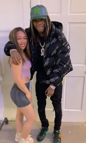 King Von wearing Amiri jeans