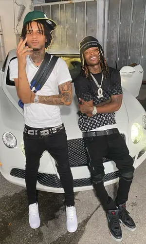 King Von wearing Amiri jeans
