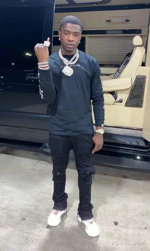Bankroll Freddie wearing Bape sweatshirt