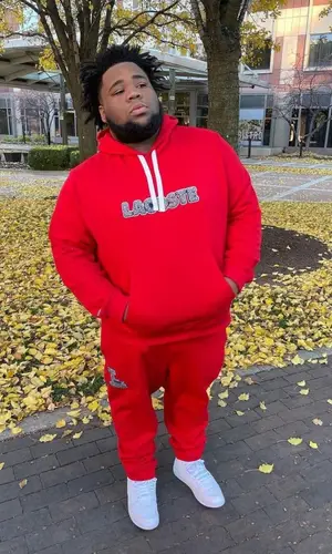 Rod Wave wearing Lacoste pants