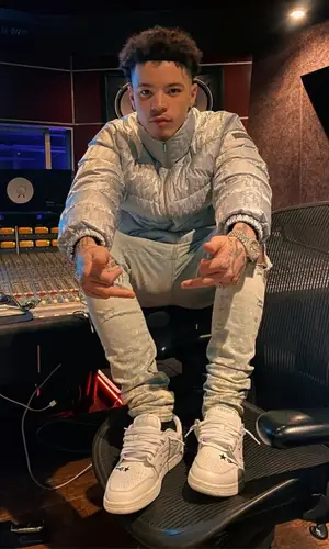Lil Mosey wearing Amiri jeans
