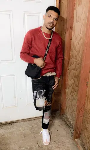 OG 3Three wearing Henny bag