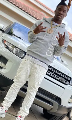 Hot Boii wearing Louis Vuitton belt