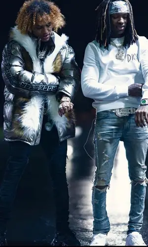 King Von wearing Amiri jeans