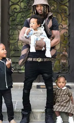 King Von wearing Amiri jeans
