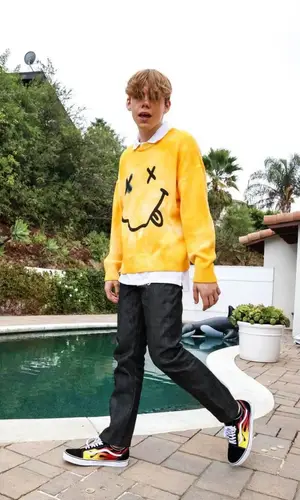 The Kid Laroi wearing Prblms jeans