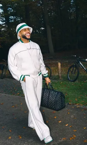 Memphis Depay wearing Casablanca trousers