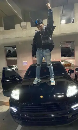 Rylo Rodriguez wearing Louis Vuitton belt