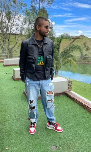 Maluma wearing Louis Vuitton jacket