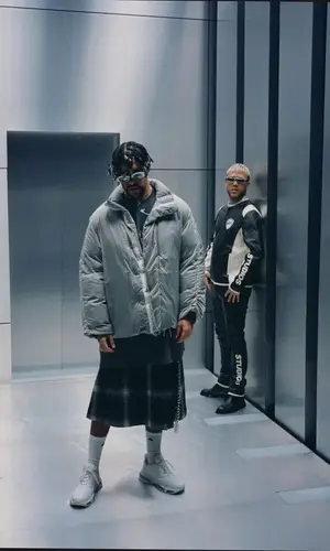 Jhay Cortez wearing Midnight Studios jacket