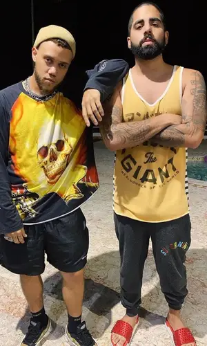 Jhay Cortez wearing Supreme top