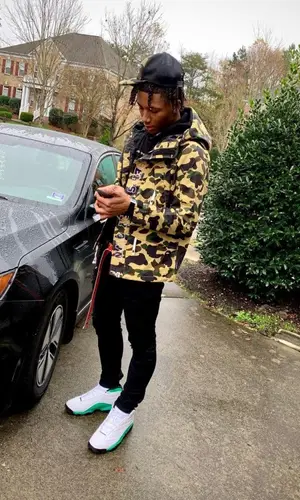 Mikey wearing Bape cap