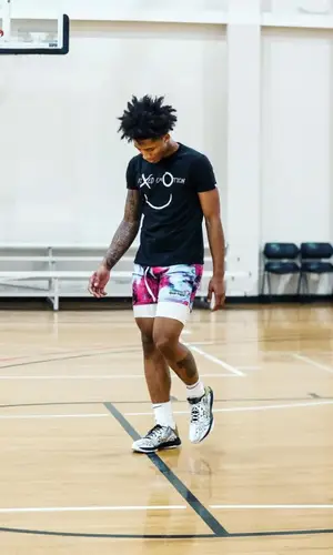 Mikey wearing Nike sock