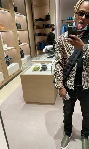 Rich The Kid wearing Bottega Veneta bag