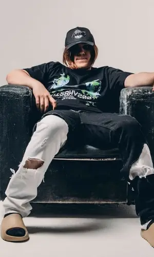 THRILL PILL wearing Raf Simons jeans