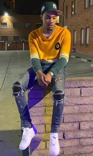 G Herbo wearing The Elder Statesman sweater
