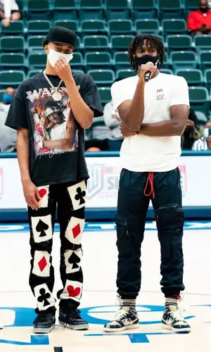 R.J. Hampton wearing Grace Court Co t-shirt