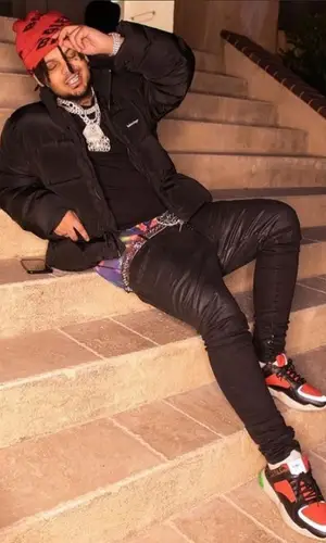Smokepurpp wearing B.B. Simon belt