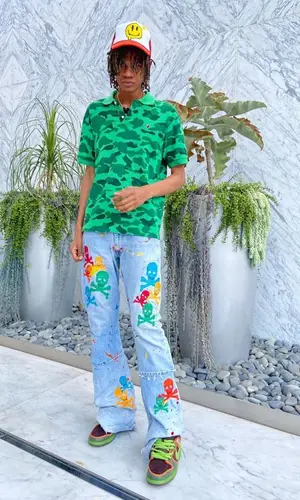 Trent Madison wearing Bape pants