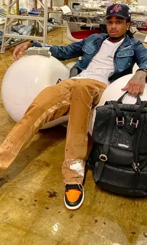 Quavo wearing Chrome Hearts backpack