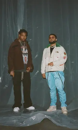 Nav wearing The North Face jacket