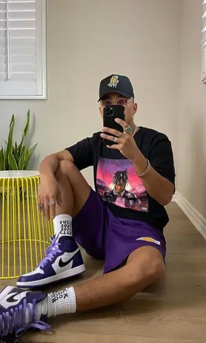 John wearing New Era cap