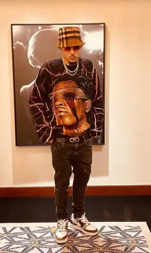 LiAngelo Ball wearing Starving Brand sweatshirt