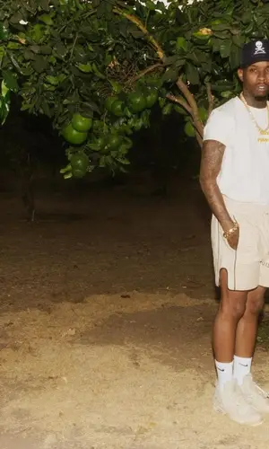 Tory Lanez wearing Etai Drori shorts