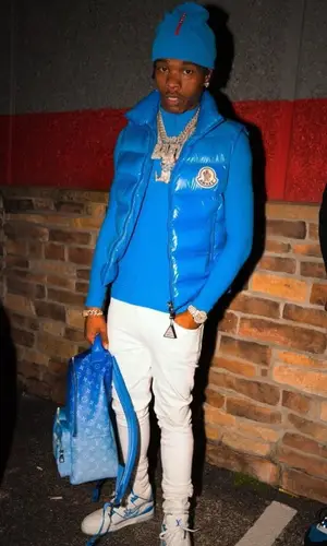 Lil Baby wearing Louis Vuitton backpack