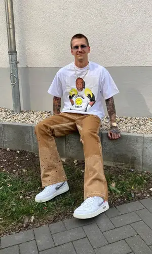 Willy Iffland wearing Gallery Dept. pants