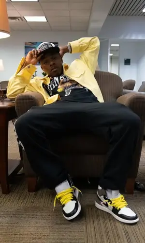 DaBaby wearing Dior shirt