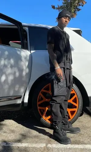 Rich The Kid wearing Rick Owens trousers