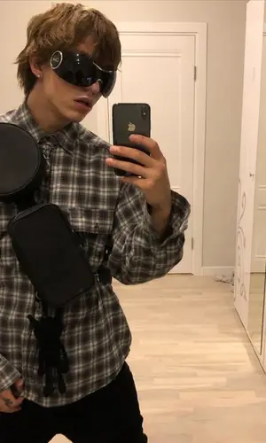 Lil Morty’s Outfit in Hediraser Bag, Dior Eyewear & Vivienne Westwood Jewelry (2020)
