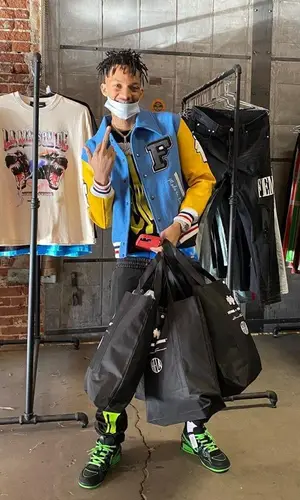 Stunna 4 Vegas wearing Le Wuz Studios pants