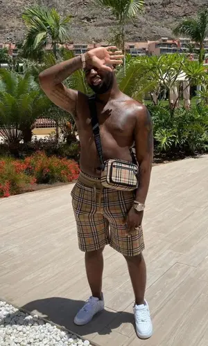Headie One wearing Burberry shorts