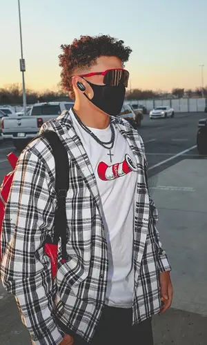 Patrick Mahomes II wearing Supreme t-shirt