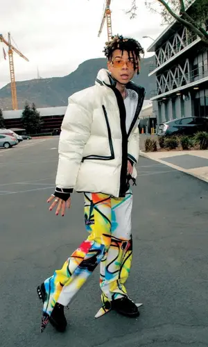 Iann Dior wearing Off-White pants