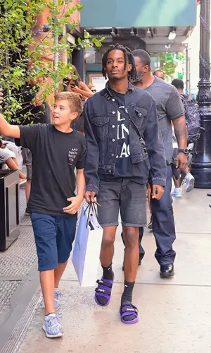 Playboi Carti wearing Playboi Carti Merch t-shirt