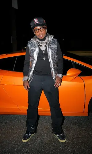 Jacquees wearing Louis Vuitton top