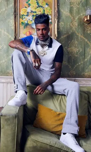 Blueface wearing FashionNova shirt