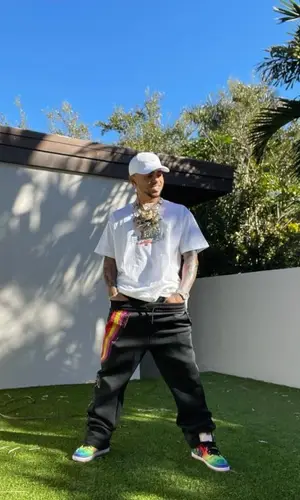 Ozuna wearing Kith cap