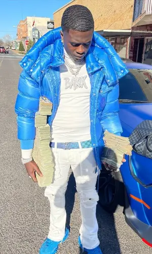 Bankroll Freddie wearing Louis Vuitton bag