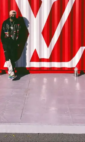 Tyga wearing Palm Angels hoody