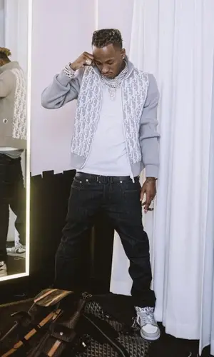 Rich The Kid wearing Dior sweater