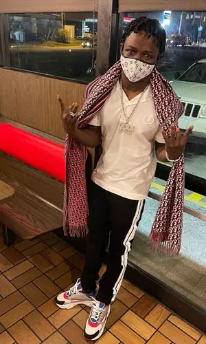Jackboy wearing Dior scarf